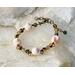 Boho style bracelet with pretty blush colored vintage shell beads